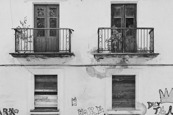 abandoned house facade black and white